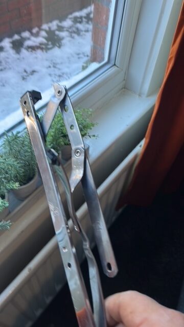 Friction stay hinge on a uPVC window