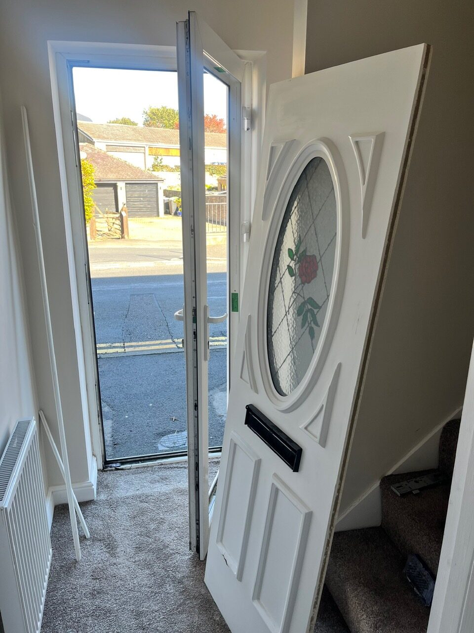 White composite front door with oval glazing