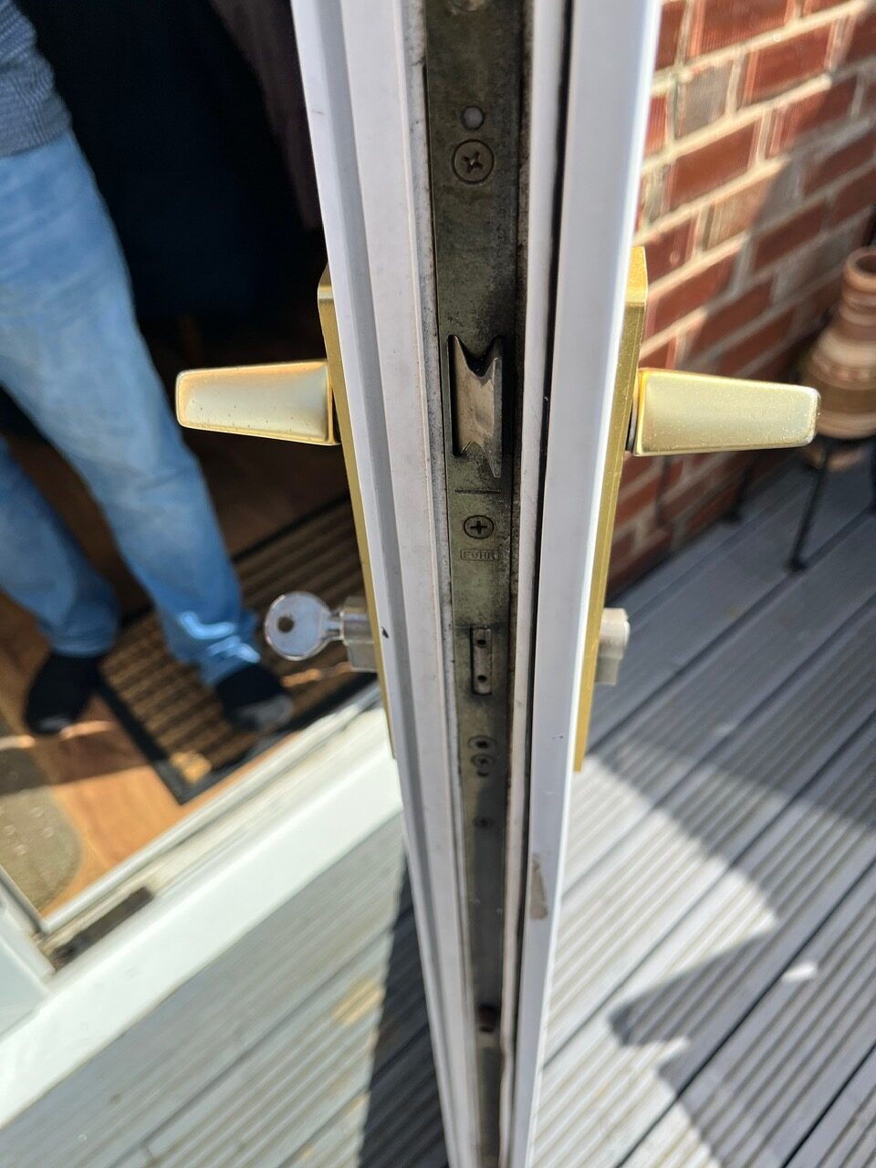 uPVC Door Lock Repairs Adjusting a door handle and lock on site
